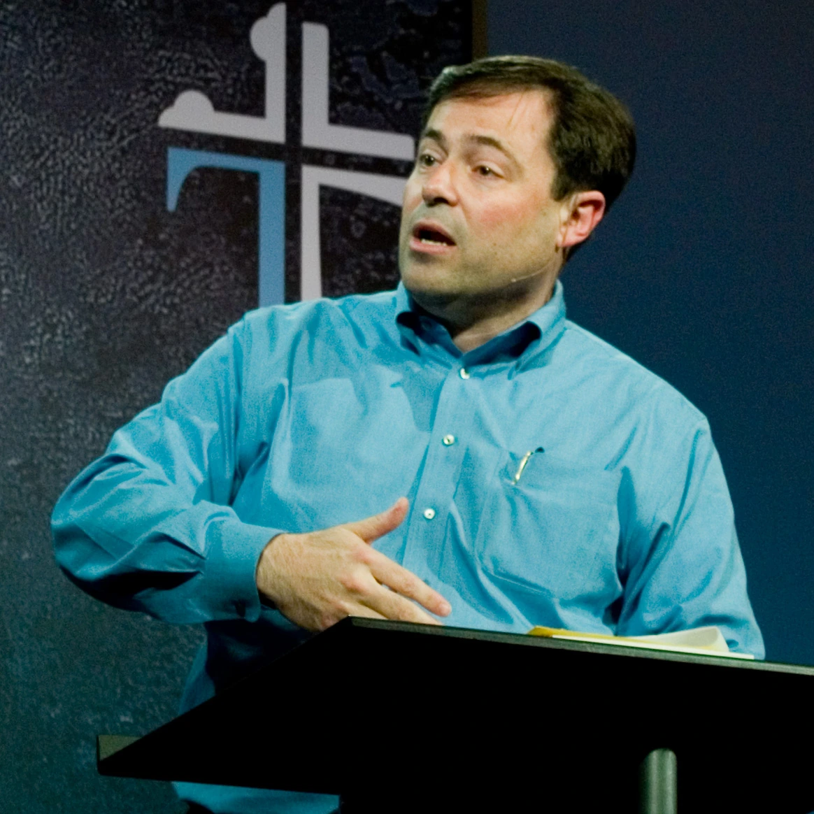 Mark Dever speaking at a lectern