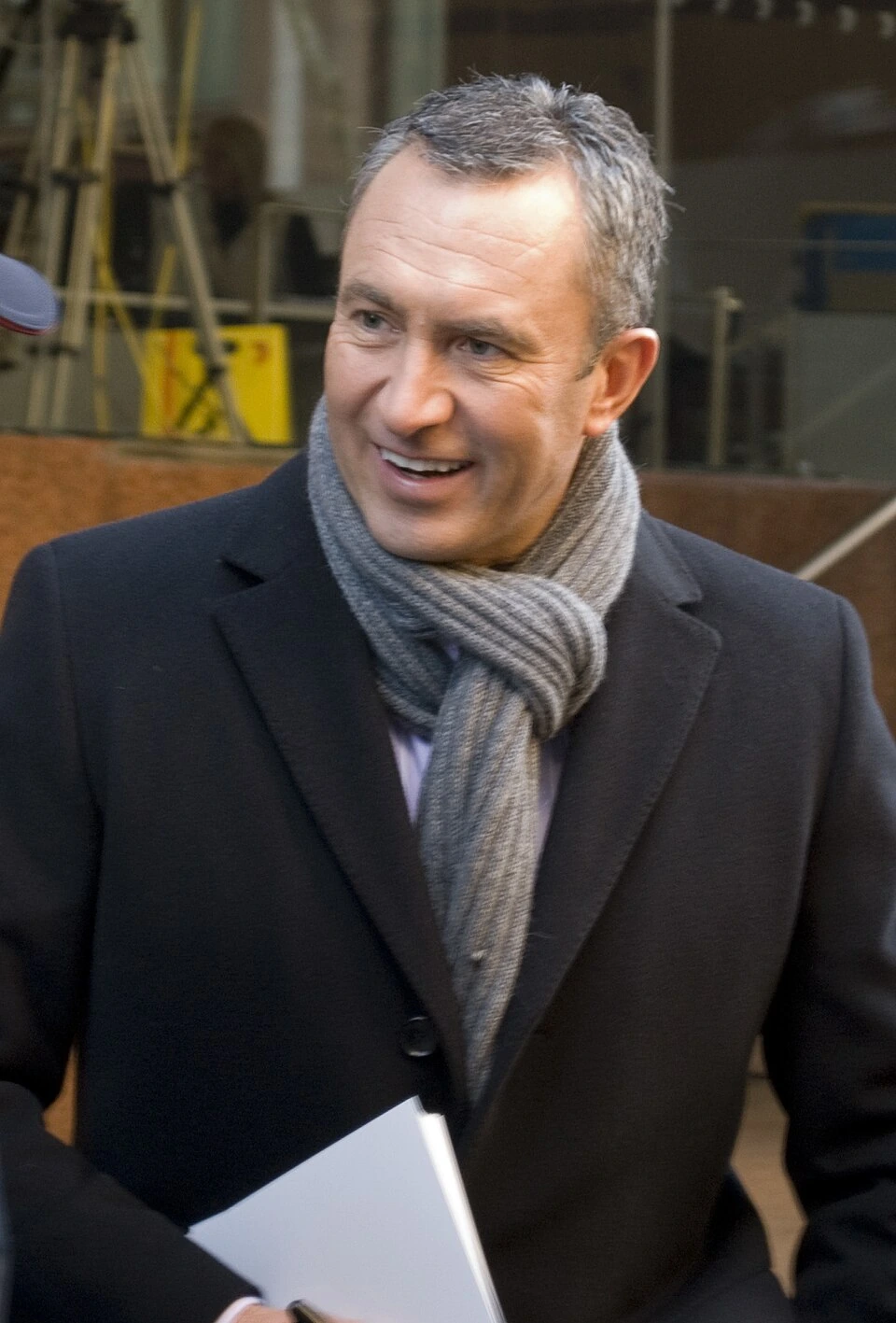 Mark Beretta standing outdoors in a coat and scarf